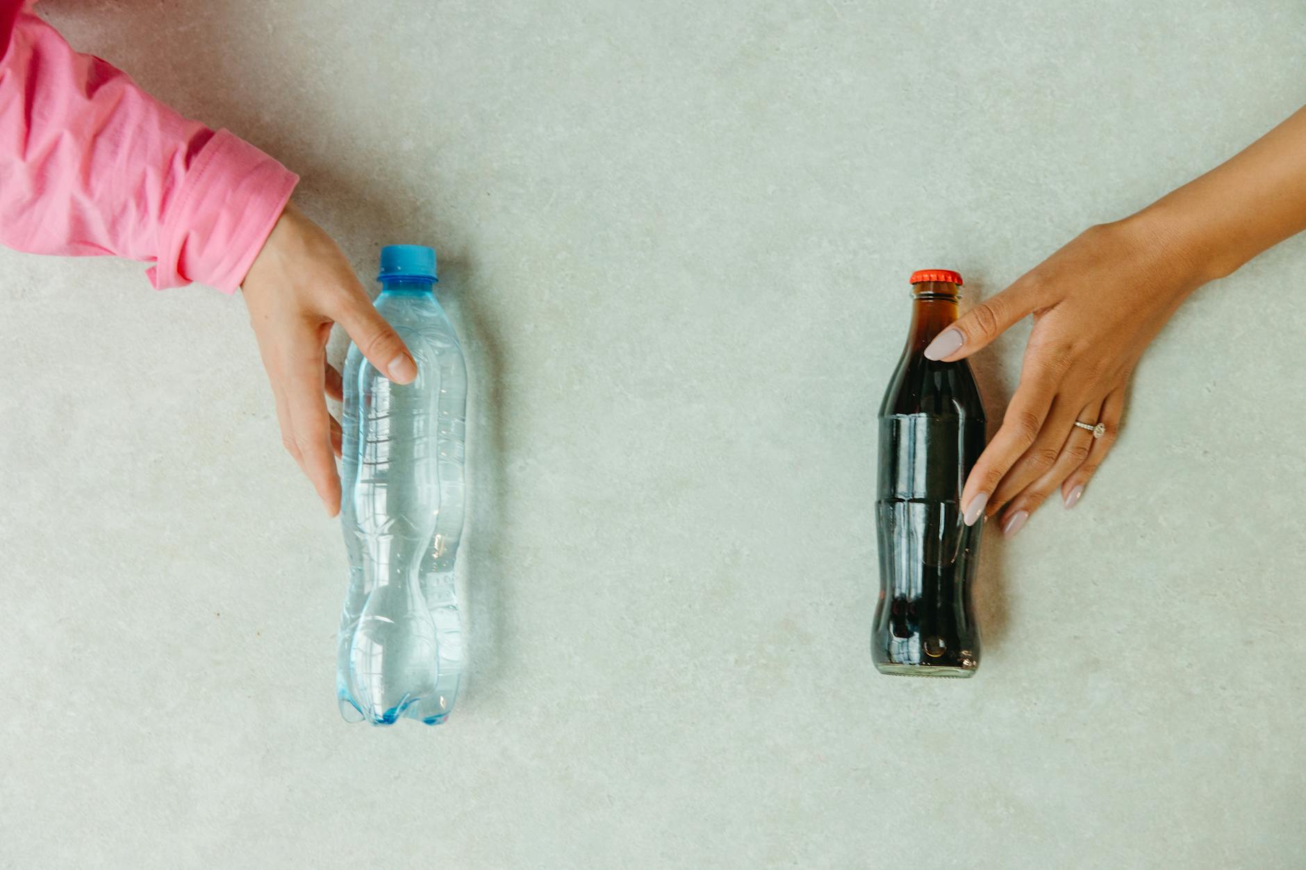 clear glass bottle on white table